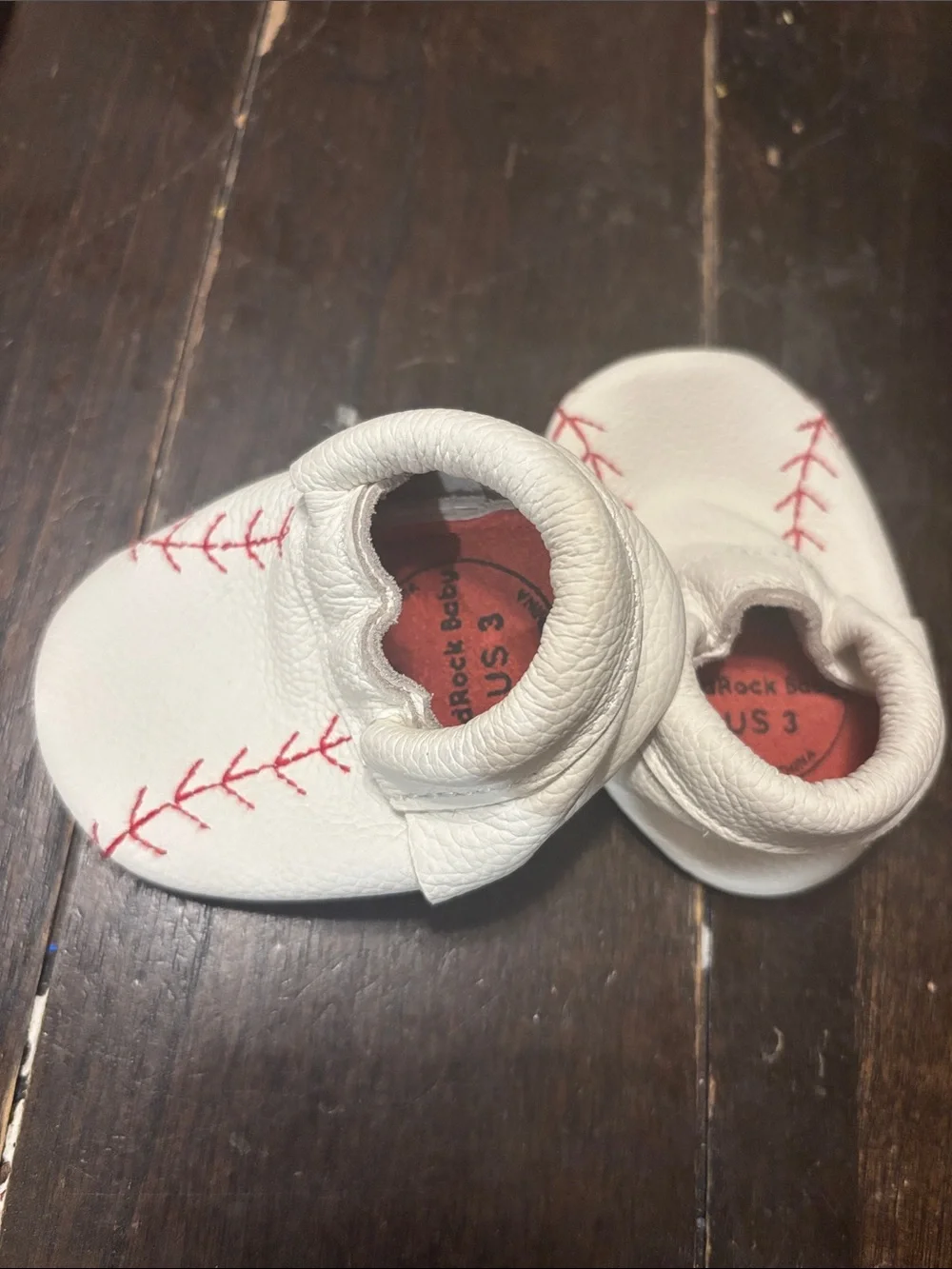 Hard Rock Cafe White Baby Moccasins with Red Stitching